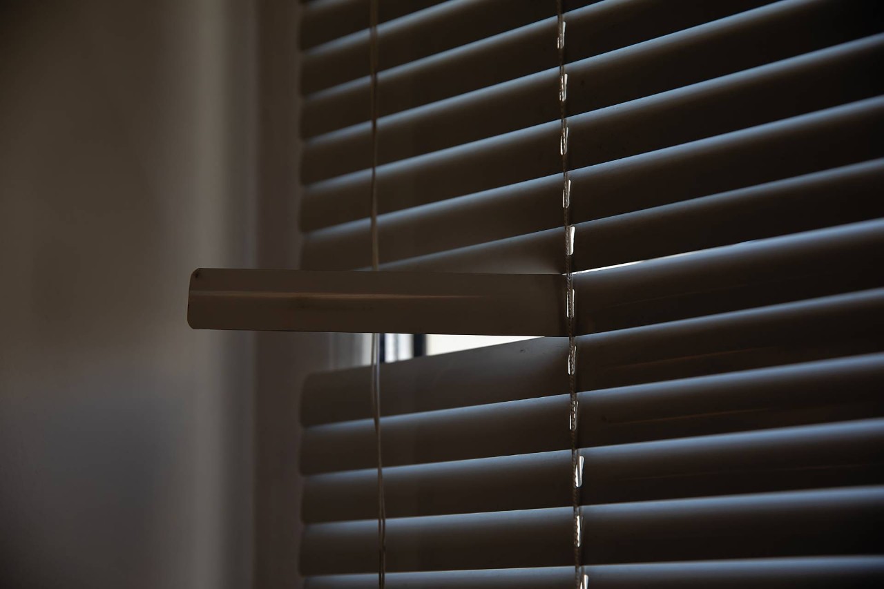 Broken window blinds in a home near Tucson, AZ.